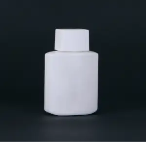 A white bottle with a cap on it