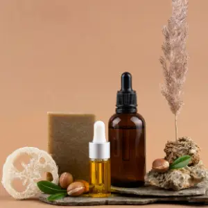 A bottle of oil, a glass jar and some nuts